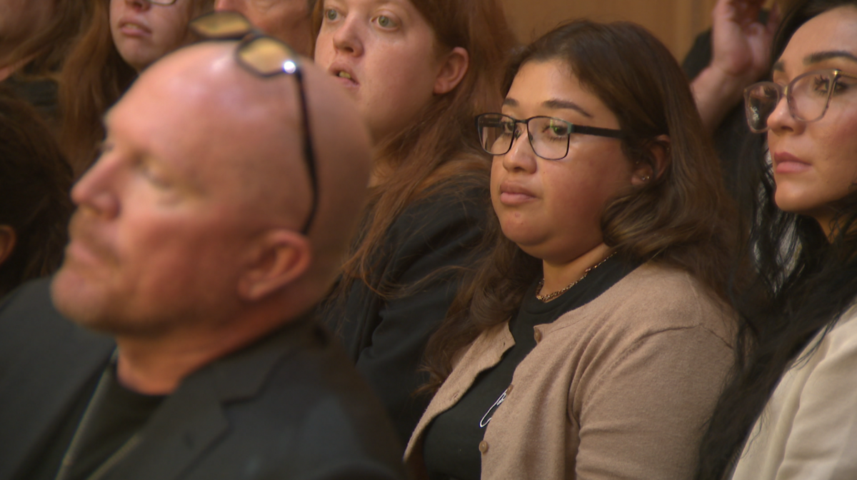 Karina Olguin, the widow of Dustin Wakefield, who was gunned down during a trip to Miami Beach, appears in court on Monday, Oct. 26, 2026.
